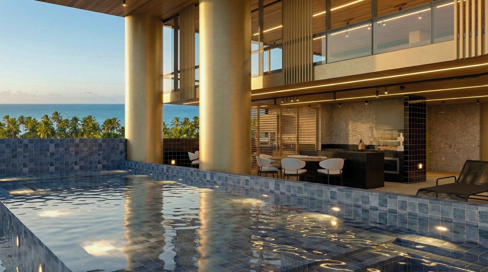 Piscina com vista para o mar e espaço gourmet integrado