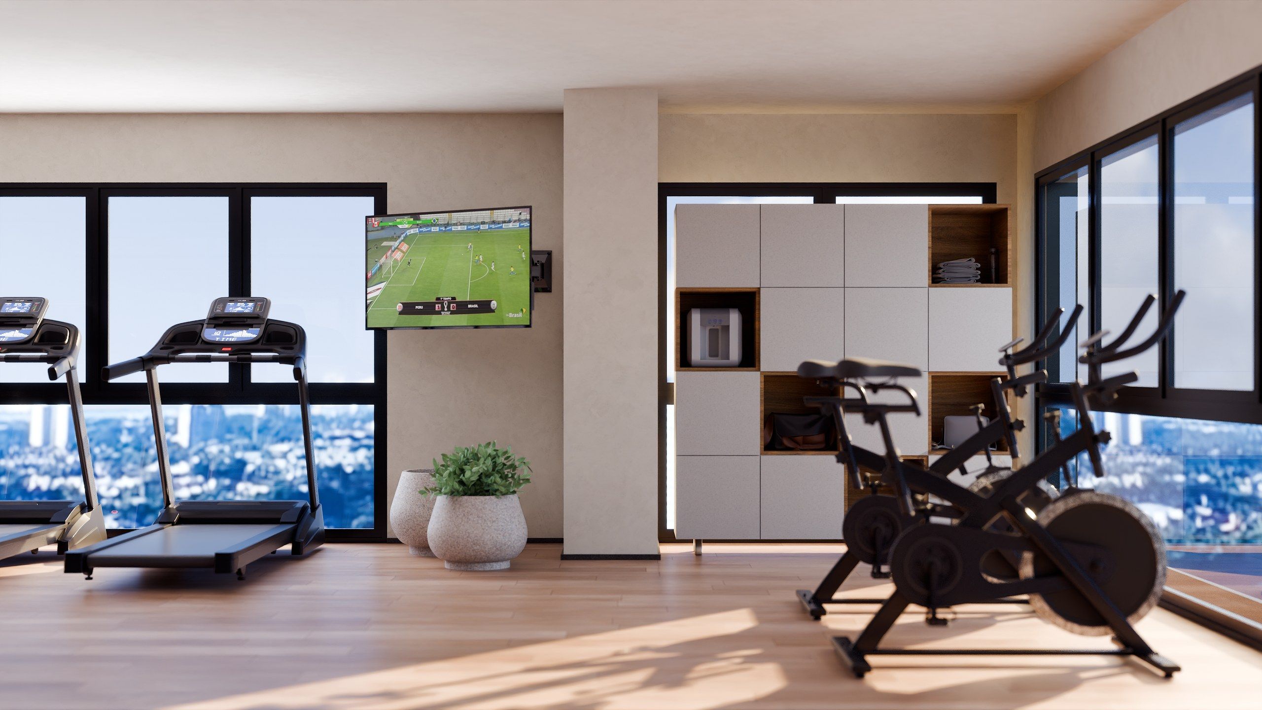 Academia com esteiras, bicicletas ergométricas e TV na parede