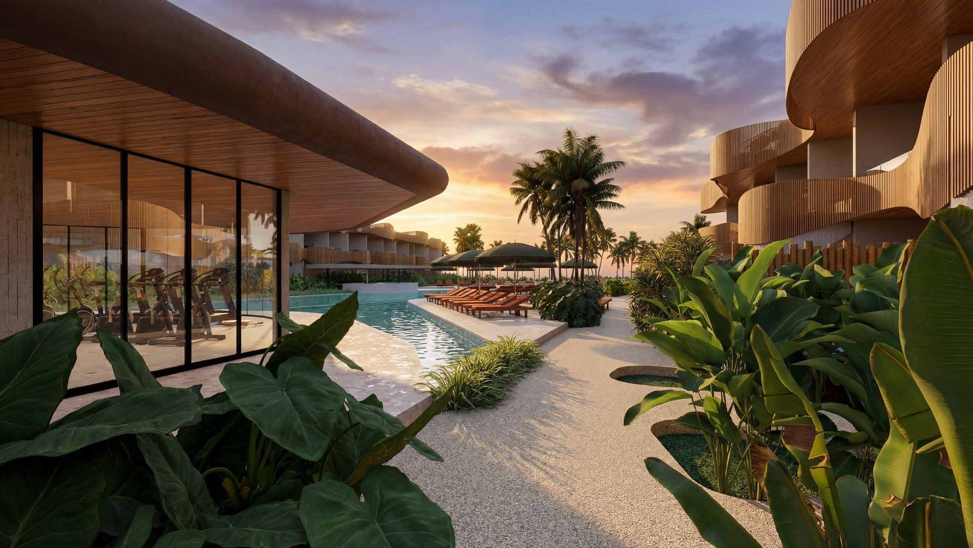 Área de convivência junto à piscina ao pôr do sol