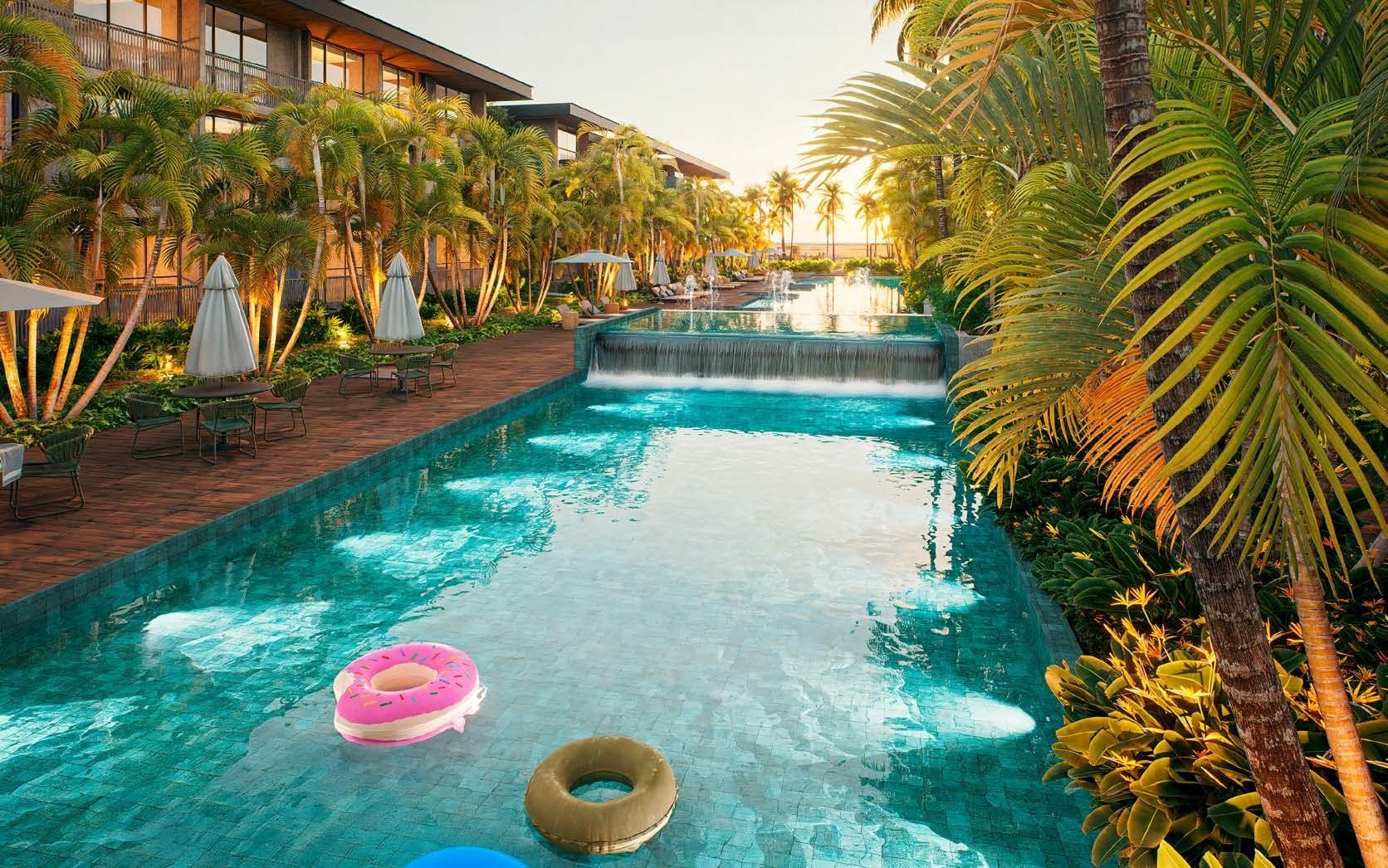 Piscina entre coqueiros