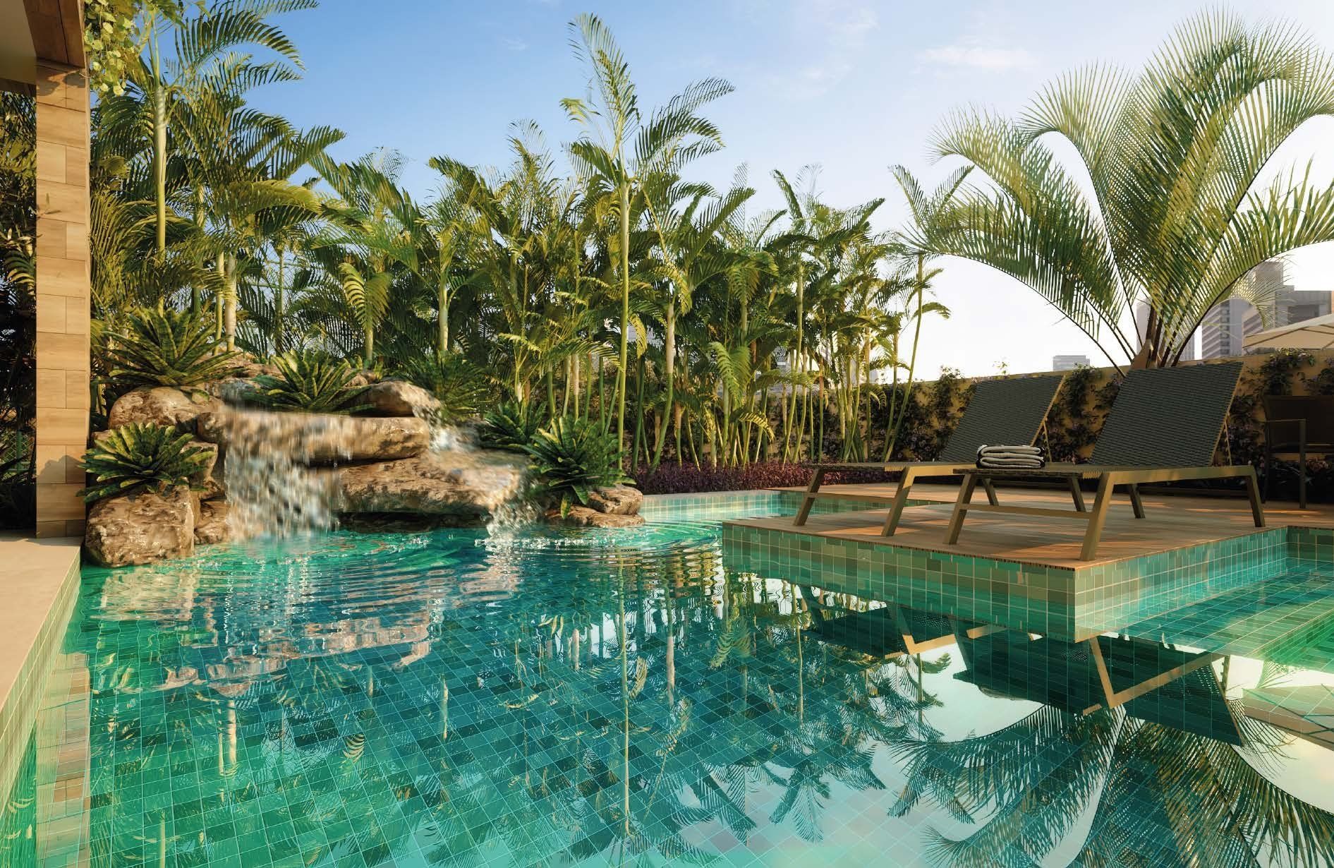 Piscina cascata em meio à vegetação (imagem ilustrativa)