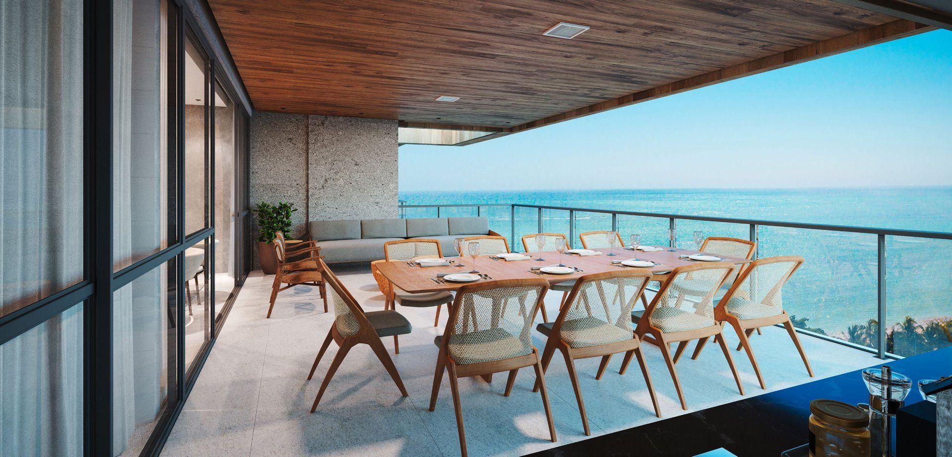 Varanda gourmet do apartamento tipo com vista para o mar