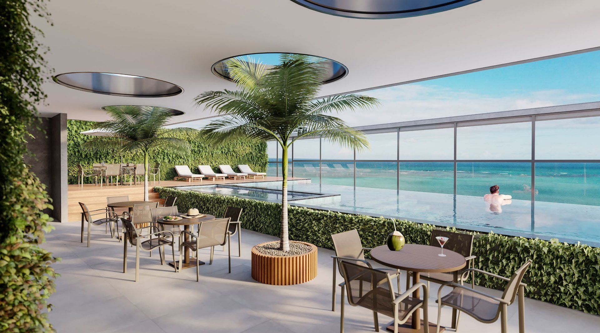Rooftop com lounge e vista para o mar