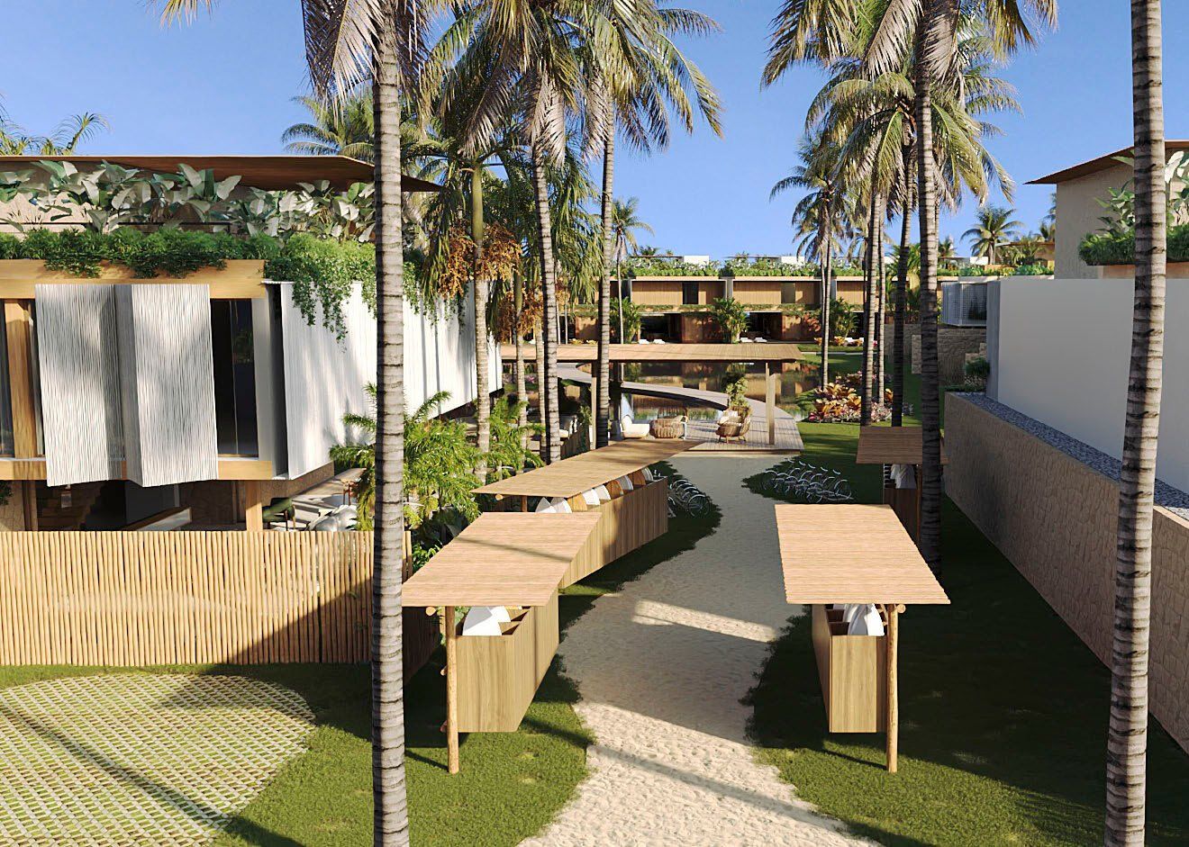 Convivência ao ar livre entre as villas, sob os coqueiros.