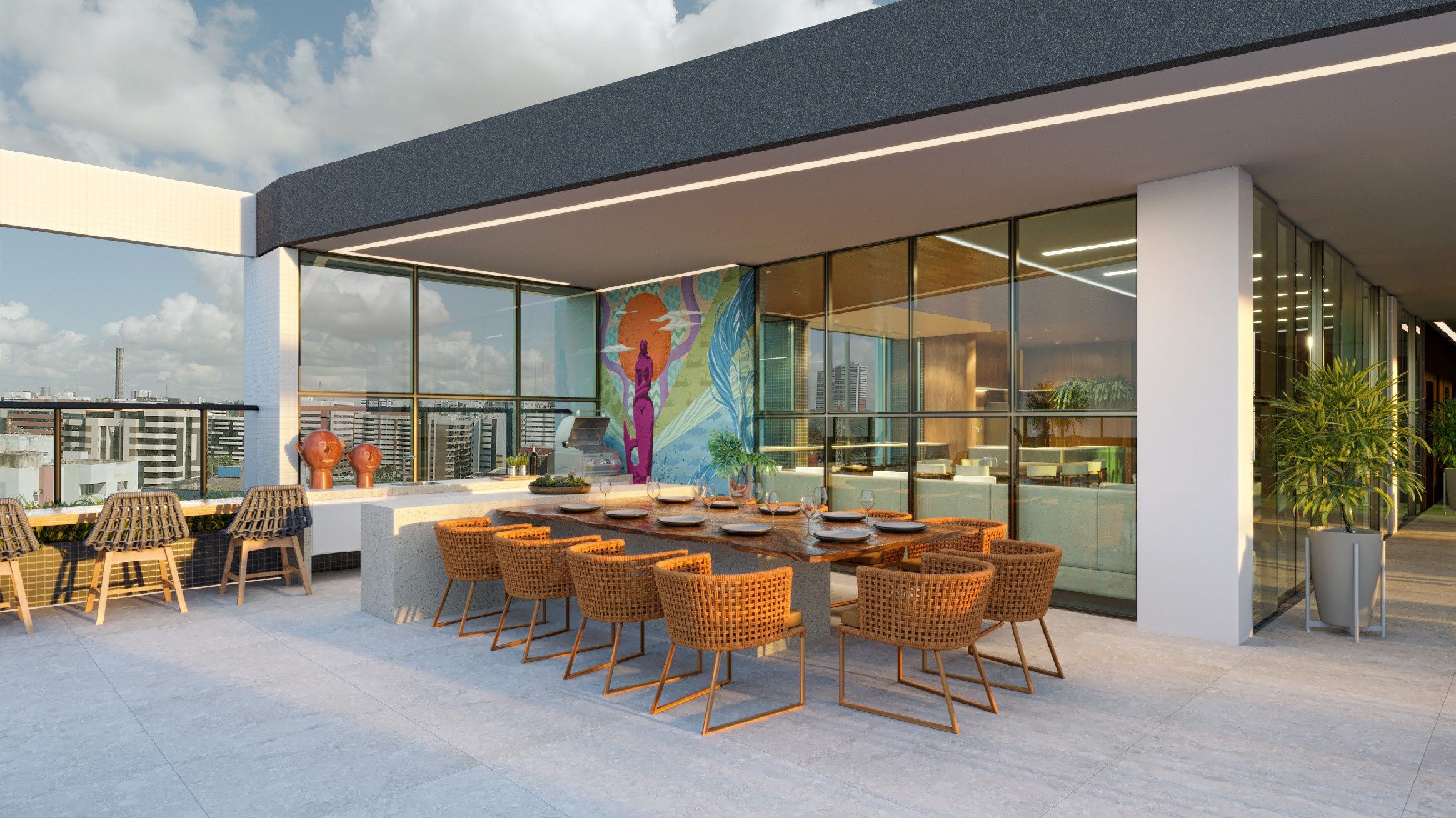 Espaço gourmet externo com churrasqueira e mesa de jantar