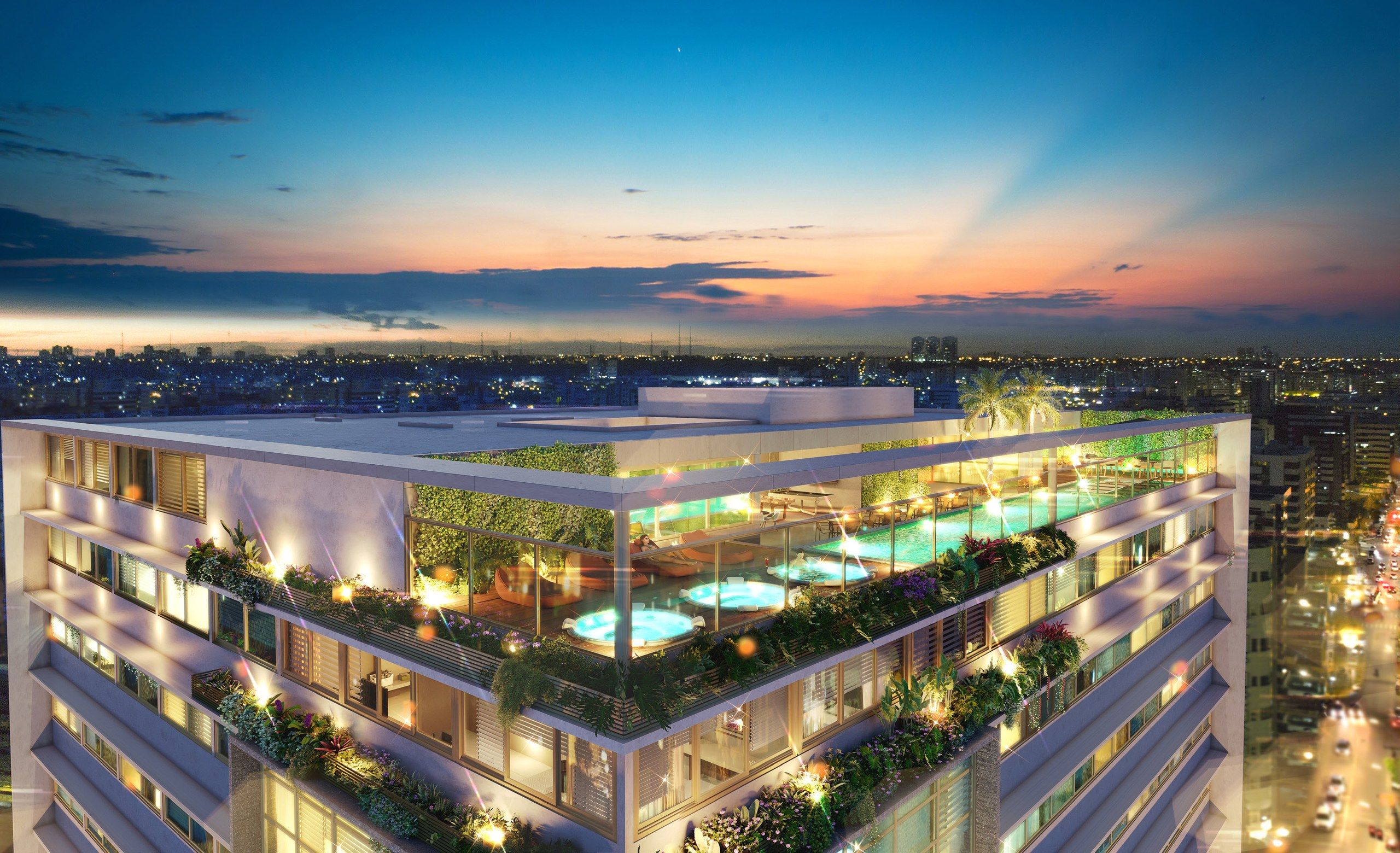 Rooftop com piscina, ofurô e área de lazer ao entardecer